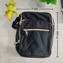 Nylon multi-pocket cross-body bag with gold zippers